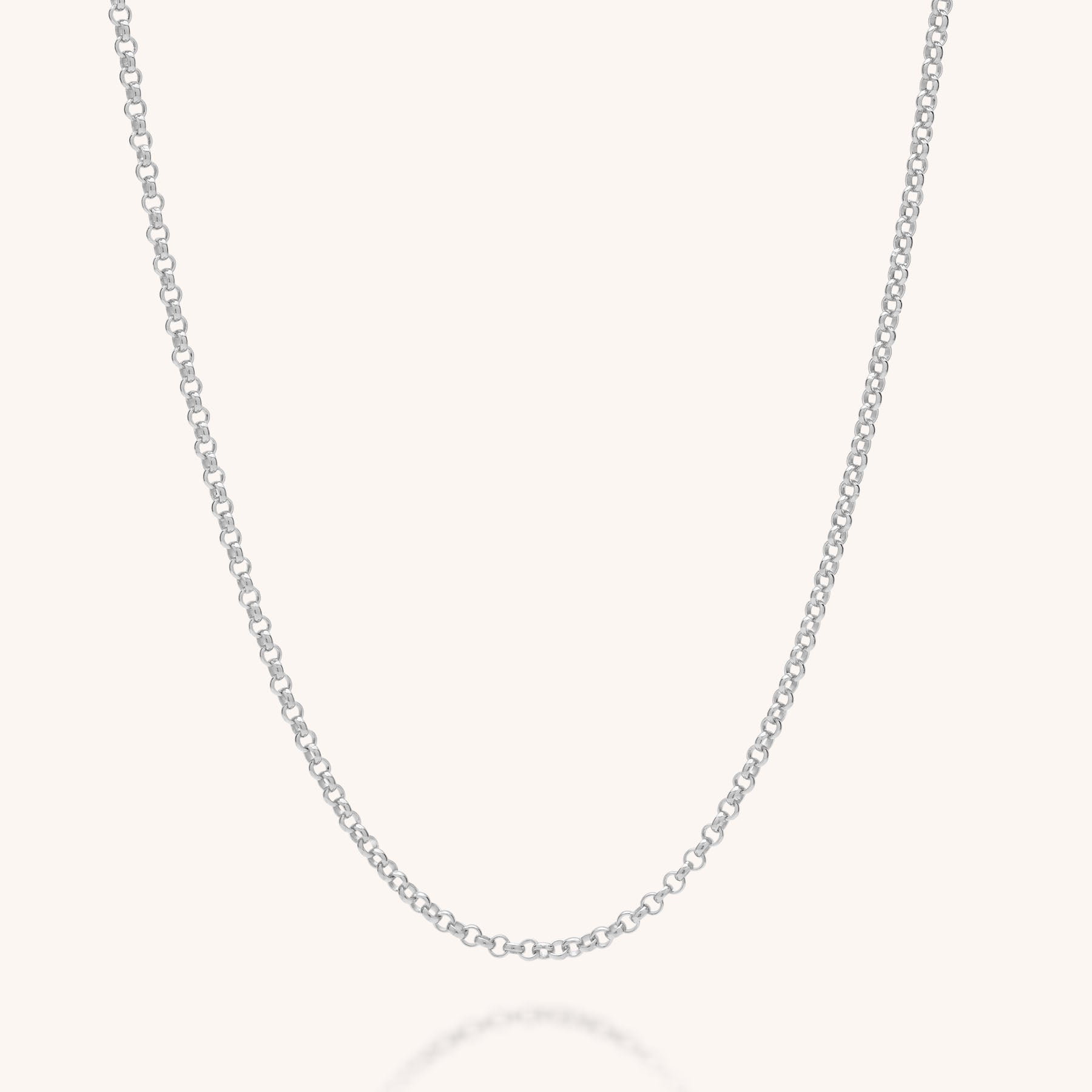 The Belcher Chain Necklace features a thin, delicate design crafted from 925 sterling silver, shown against a plain light background.