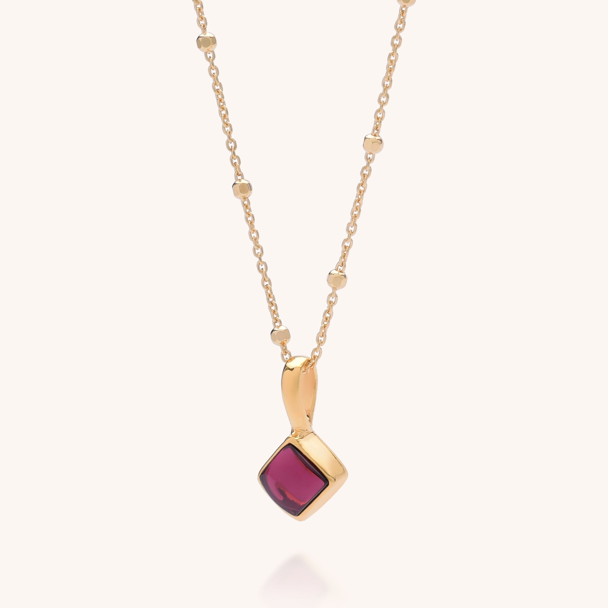Diamond Birthstone Necklace January—features a delicate gold chain with small beads and a square-shaped Garnet gemstone pendant, making it an ideal birthstone jewellery piece or personalised birthday gift.