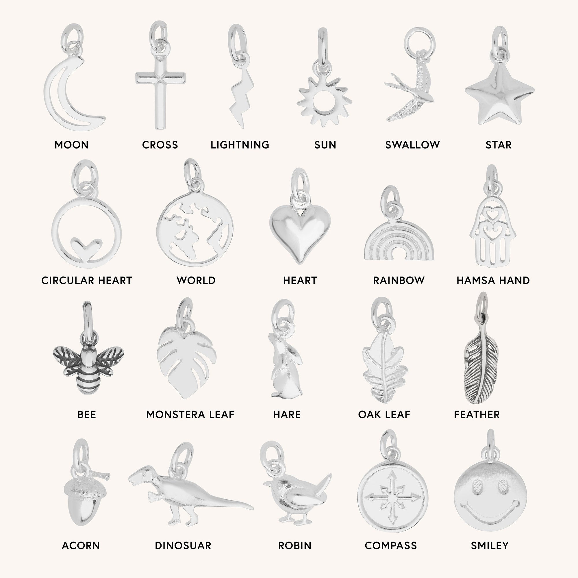 A set of 20 silver charms, each in unique shapes like the moon, cross, lightning bolt, sun, swallow, heart, world, and more—crafted from Eco Sterling Silver. Ideal for customizing your Tubular Satellite Chain.