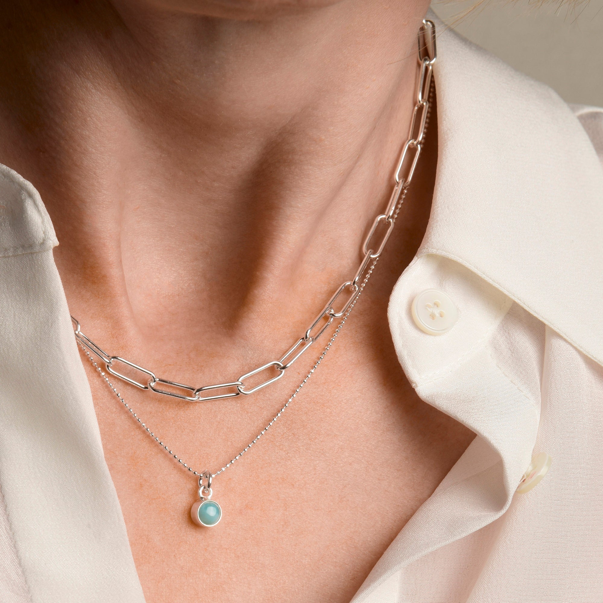 Nellou sterling silver paperclip necklace stacked with larimar natural gemstone necklace