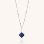 Diamond Birthstone Necklace September—silver chain with small round beads and a square Lapis pendant accented by gold flecks, set in a silver frame, shown against a plain light background.