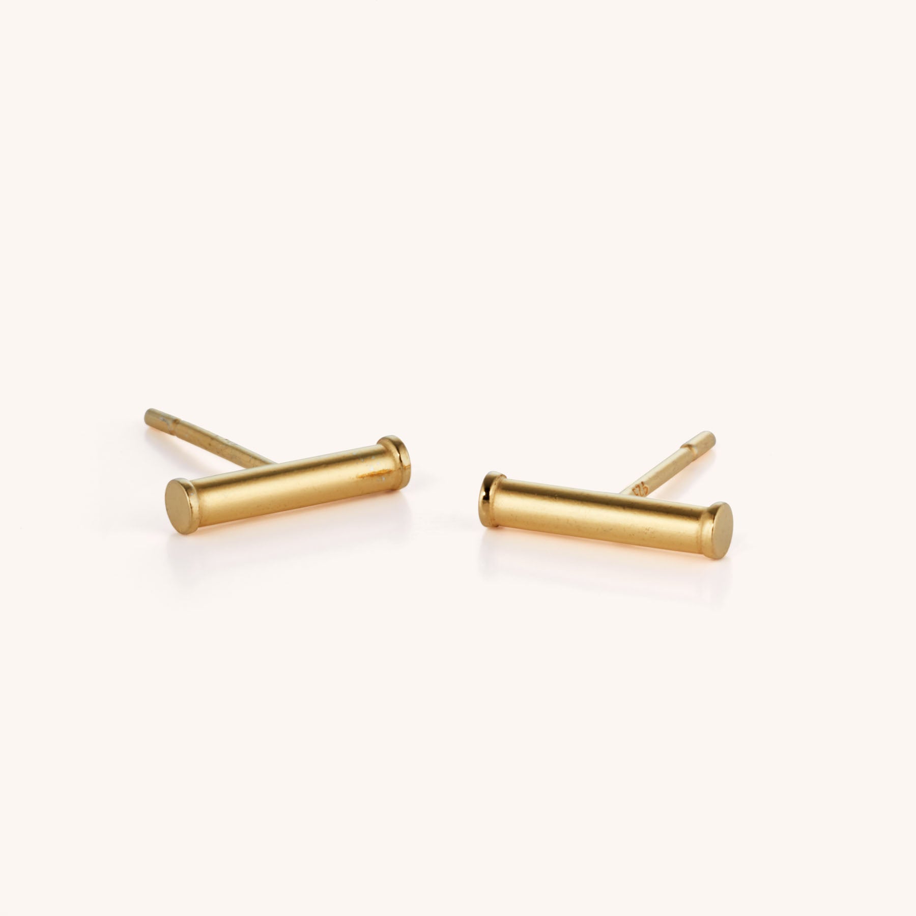 Bar Stud Earrings are shown on a light background. Each hypoallergenic earring has a horizontal bar and straight post, making them perfect for everyday wear.