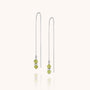 Fall Earrings Birthstone August: Sterling silver threader earrings with delicate chains, each showcasing two Peridot gemstones—the August birthstone—and a round silver accent bead at the end, displayed on a plain white background.