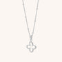 The Clover Necklace features a delicate silver chain with small beads and a simple open four-leaf clover pendant—an elegant addition to any jewellery collection.