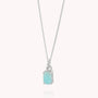 The Amazonite Octavia Necklace is a sterling silver necklace with a thin chain, featuring a rectangular light blue amazonite gemstone pendant set in a simple metal setting.