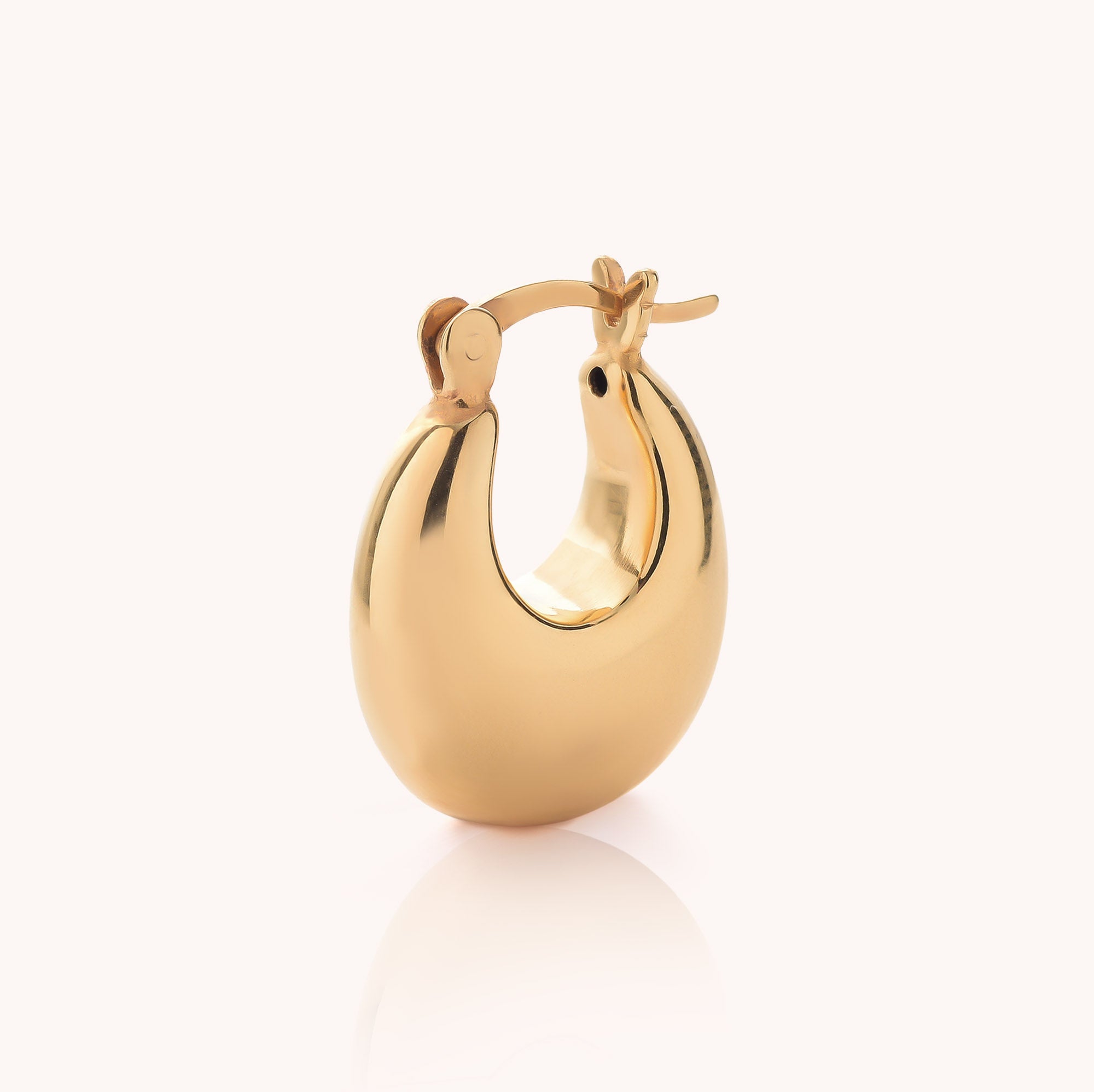 Introducing the Dome Hoop Earrings: a single, shiny gold earring featuring a rounded, chunky silhouette and secure latch-back closure, shown against a plain white background—an ideal everyday accessory that brings subtle sculptural elegance to any look.