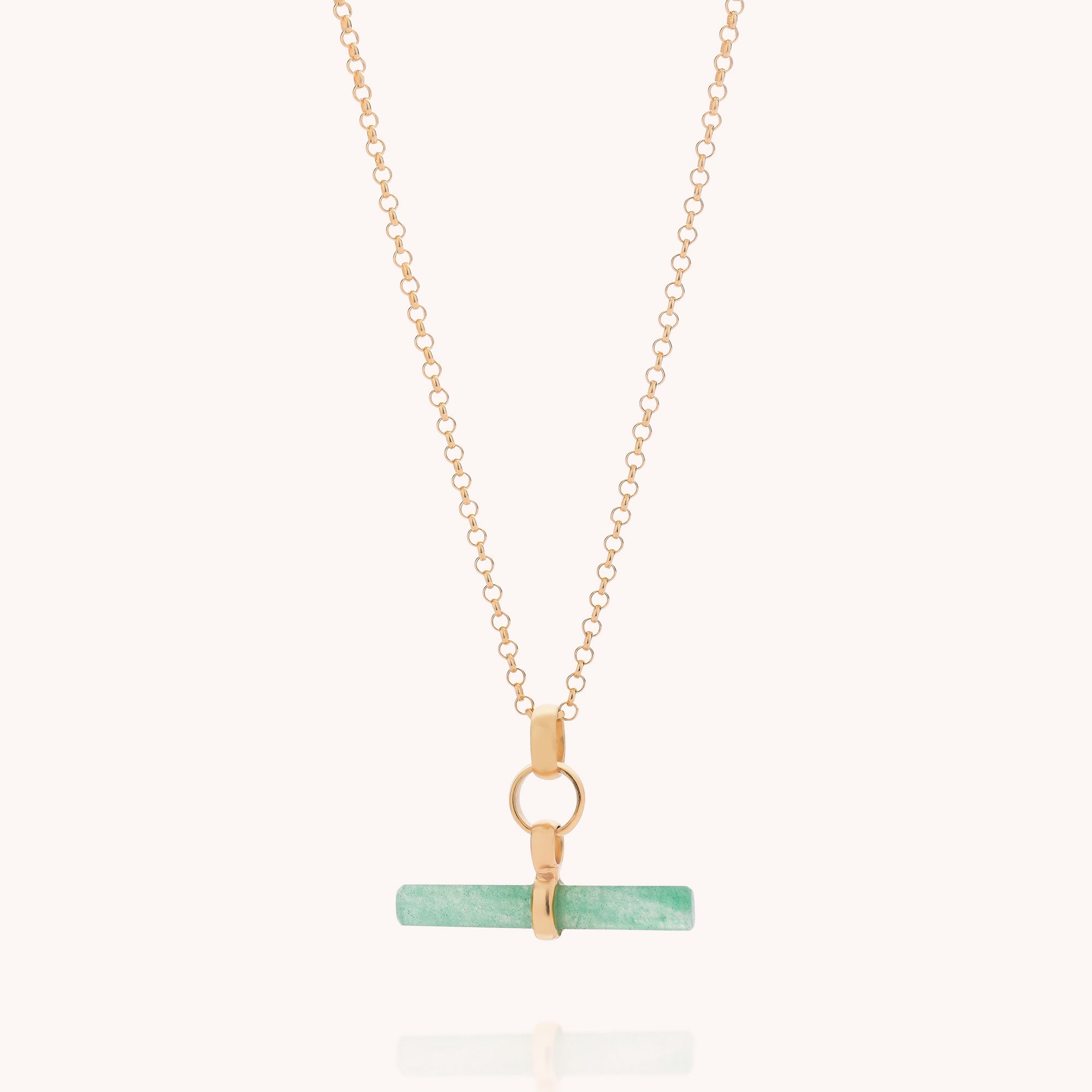 Green Aventurine T-Bar Necklace displayed against a light neutral background—an elegant addition to your gemstone jewellery collection, featuring a gold chain and a horizontal green aventurine stone bar held by gold clasps.