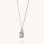 The Labradorite Octavia Necklace features a sterling silver chain and a rectangular, faceted labradorite stone pendant set in a minimalist four-prong setting, elegantly displayed against a plain white background—perfect for everyday wear.