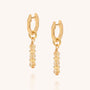 Citrine birthstone ear hoops in gold product image