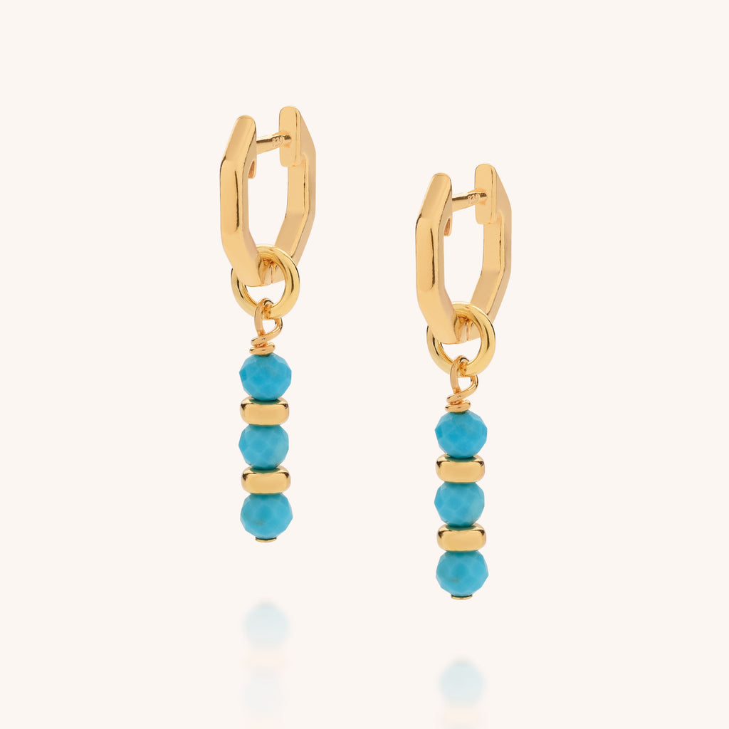 Turquoise birthstone ear hoops in gold product image