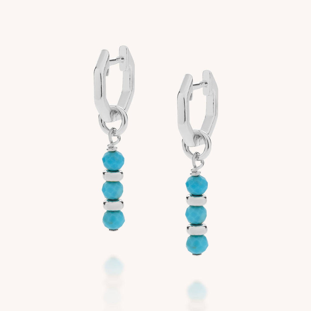 Turquoise birthstone ear hoops in silver product image